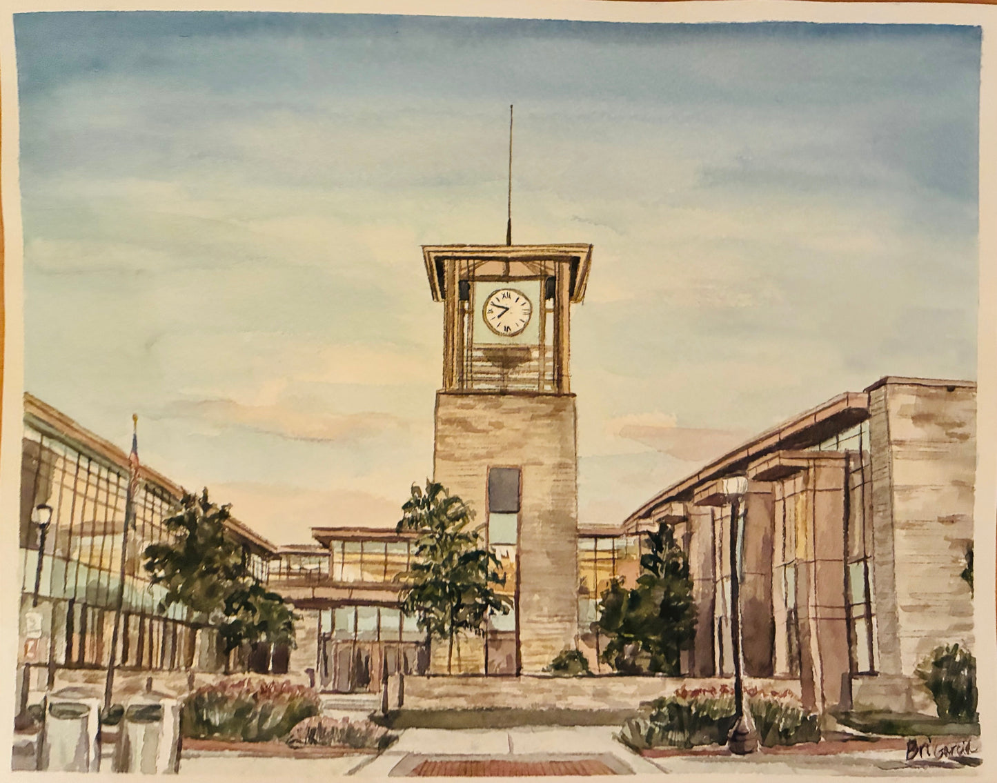 This is a watercolor painting of a city building at sunset