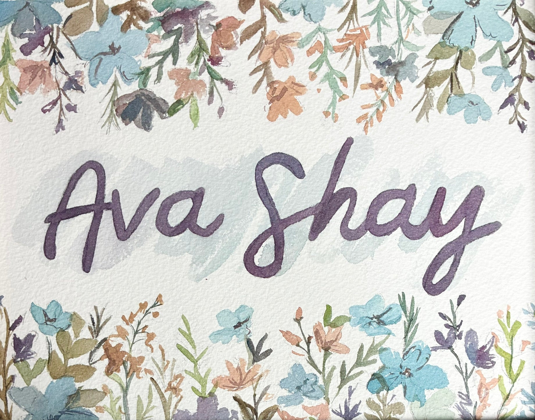 there is a watercolor painting with the name ava shay with flowers around it
