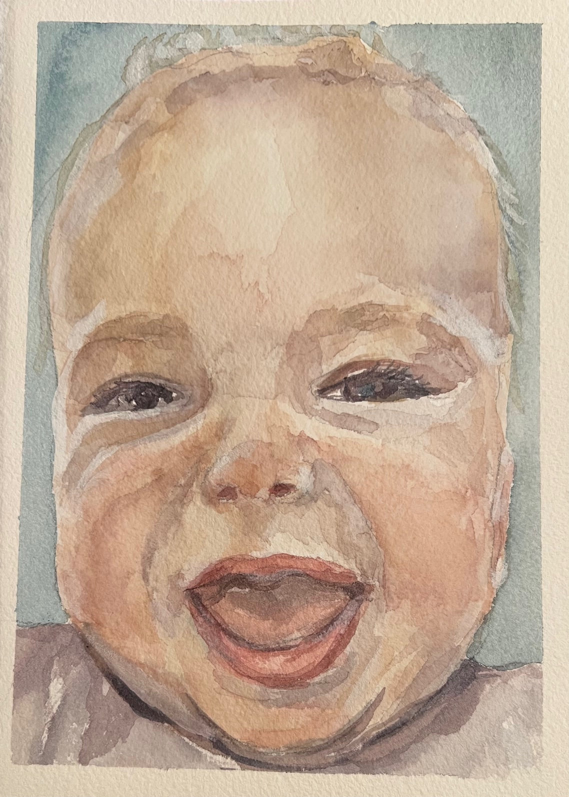 watercolor painting with a smiling baby boy