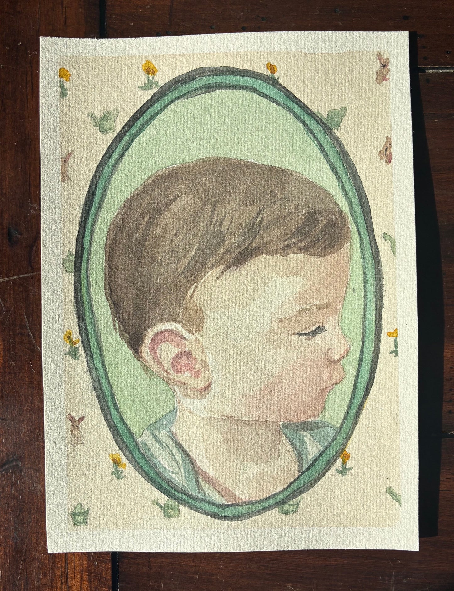 in this watercolor painting, there is a silhouette of a boy